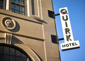 outdoor name sign with lights for Quirk Hotel in Richmond, Virginia, brand logo design in unique font
