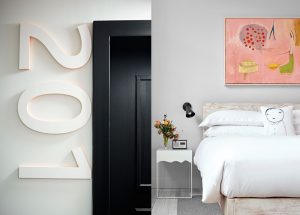 guest rooms at Quirk Hotel in Richmond, VA with playful whimsical style, brand identity by creative agency
