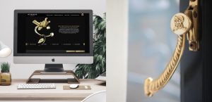 hospitality brand website design by creative agency, ornate gold window handle with residences emblem